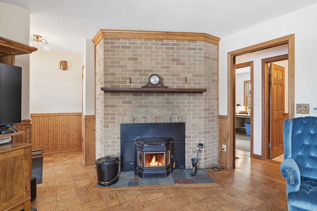 9 East Hill Road Monson, MA 01057 - Photo 11 of 41 a living room with a fireplace and a fireplace