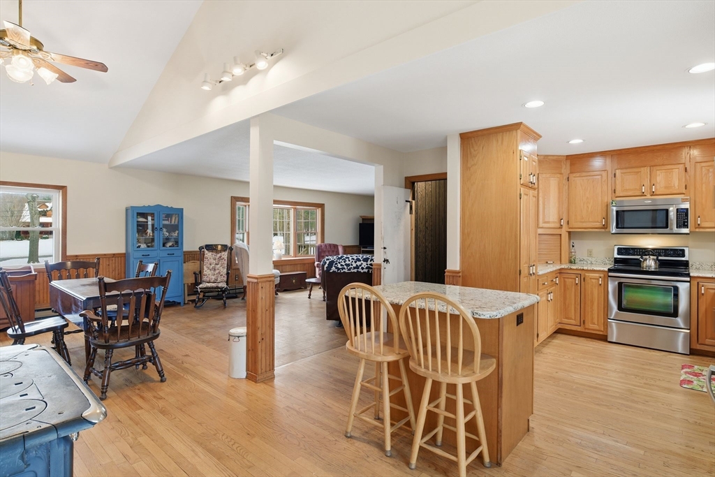 9 East Hill Road Monson, MA 01057 - Photo 17 of 41 a view of a dining room with furniture window and wooden floor