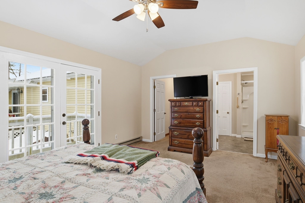 9 East Hill Road Monson, MA 01057 - Photo 24 of 41 a bedroom with a bed and flat screen tv