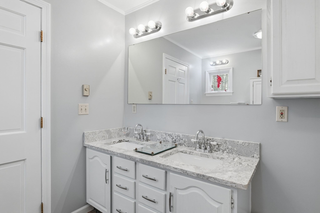9 East Hill Road Monson, MA 01057 - Photo 26 of 41 a bathroom with a sink and a mirror
