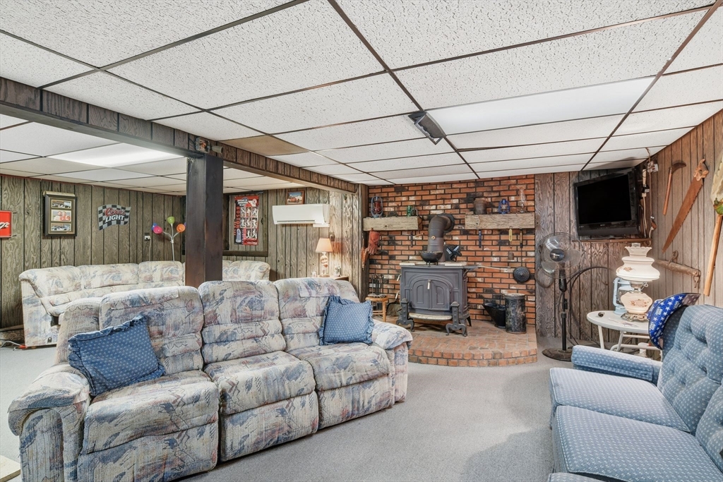 9 East Hill Road Monson, MA 01057 - Photo 32 of 41 a living room with furniture and a flat screen tv