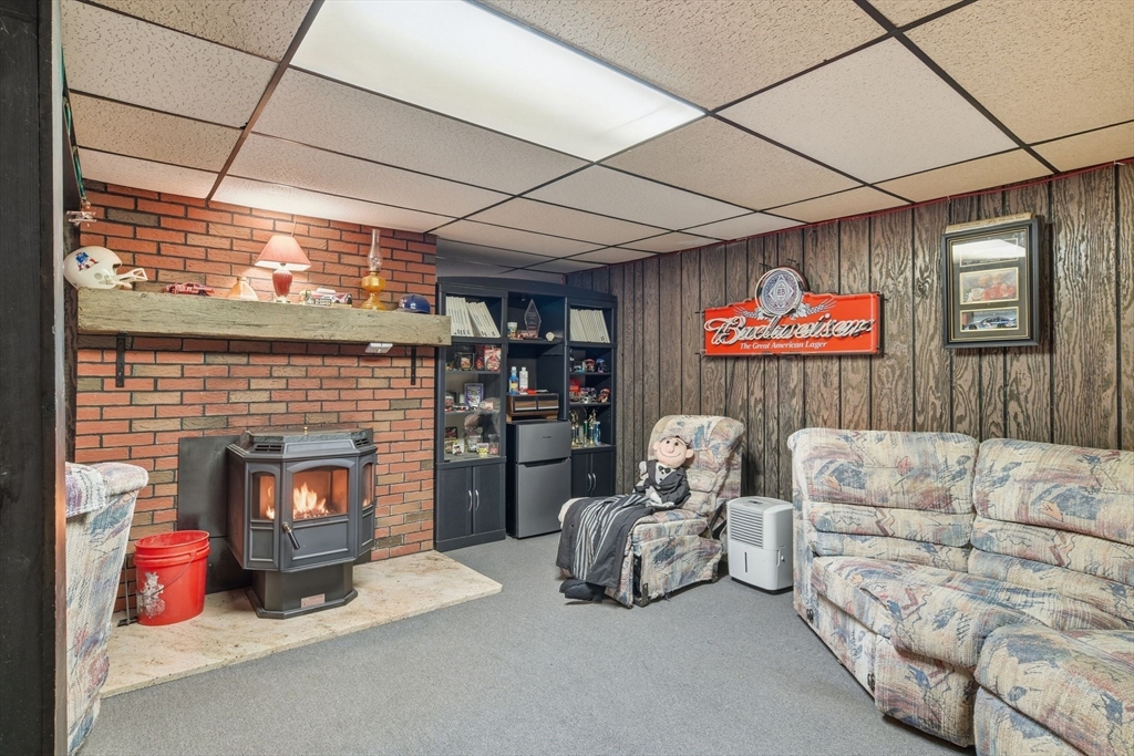 9 East Hill Road Monson, MA 01057 - Photo 33 of 41 a living room with furniture and a fireplace