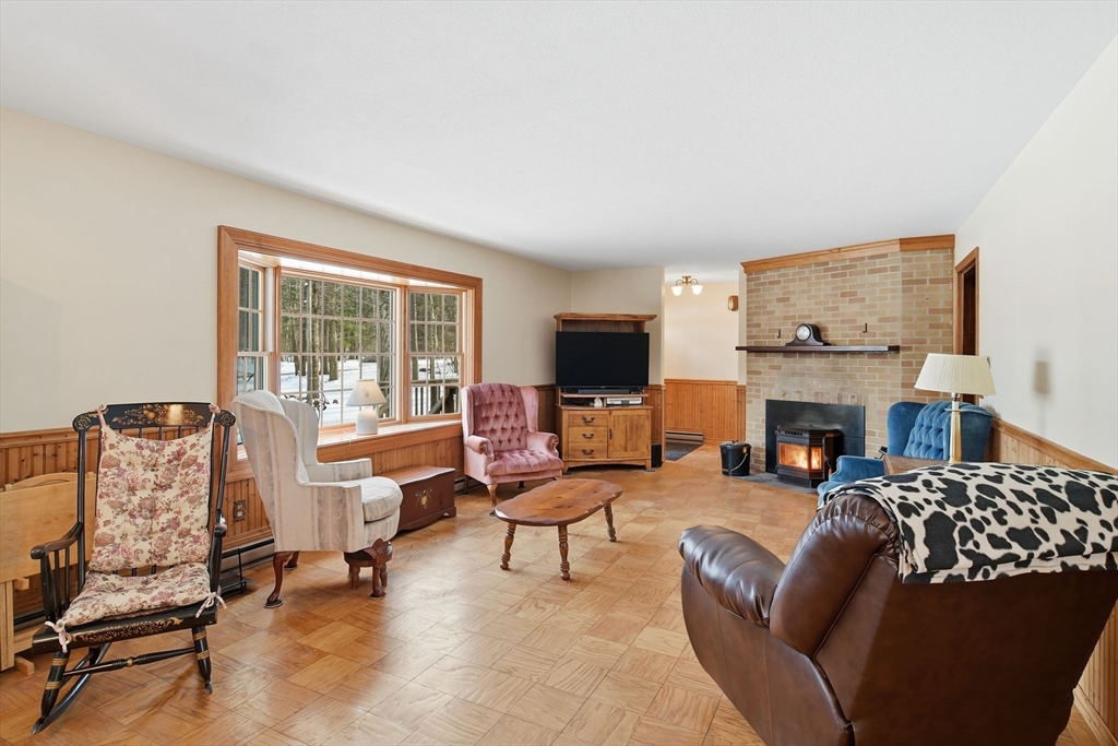 9 East Hill Road Monson, MA 01057 - Photo 10 of 41 a living room with furniture and a fireplace