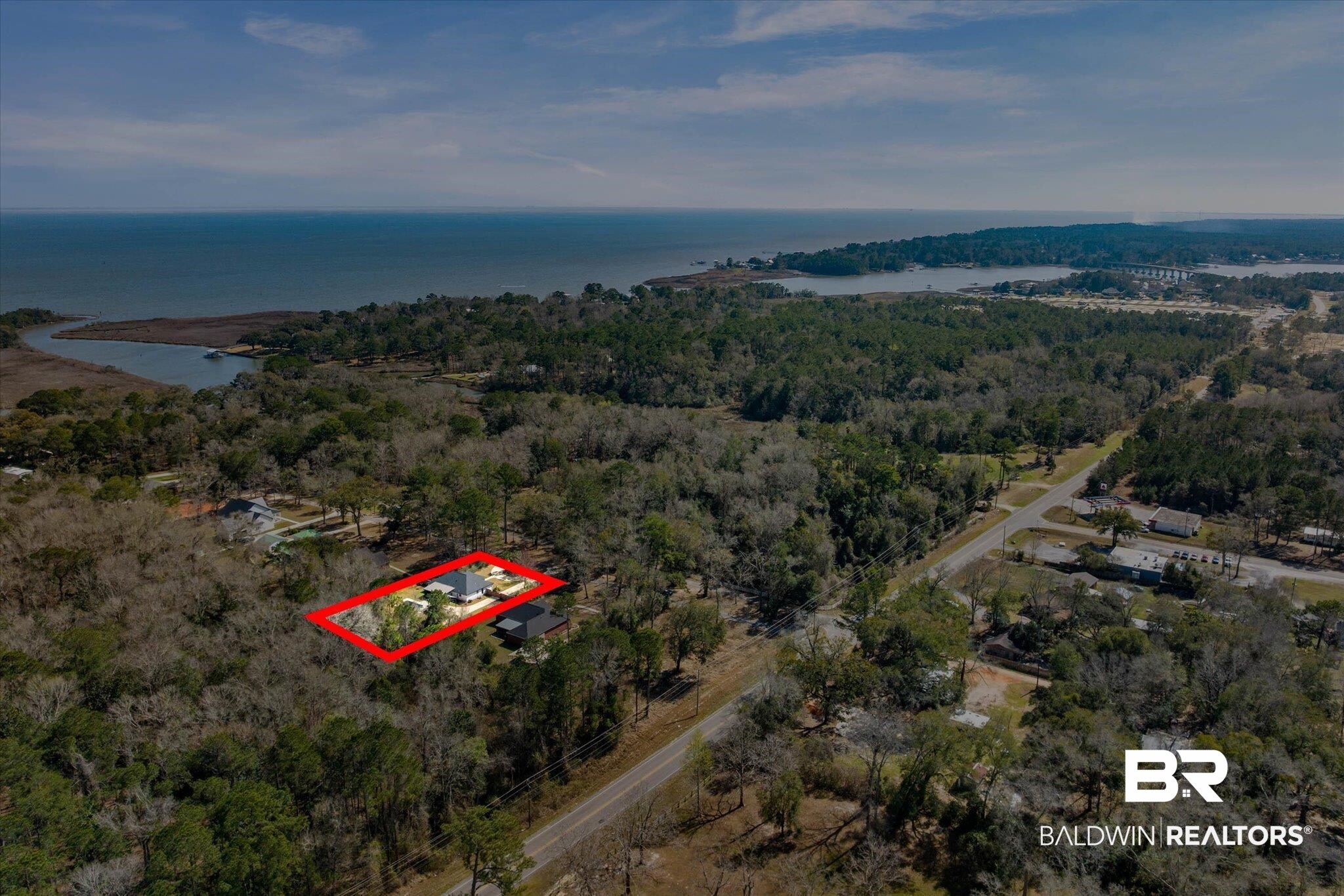 3216 Bay Booster Club Road Theodore, AL 36582 - Photo 36 of 46 Aerial view of property and surrounding area featuring a large body of water and property parcel outlined