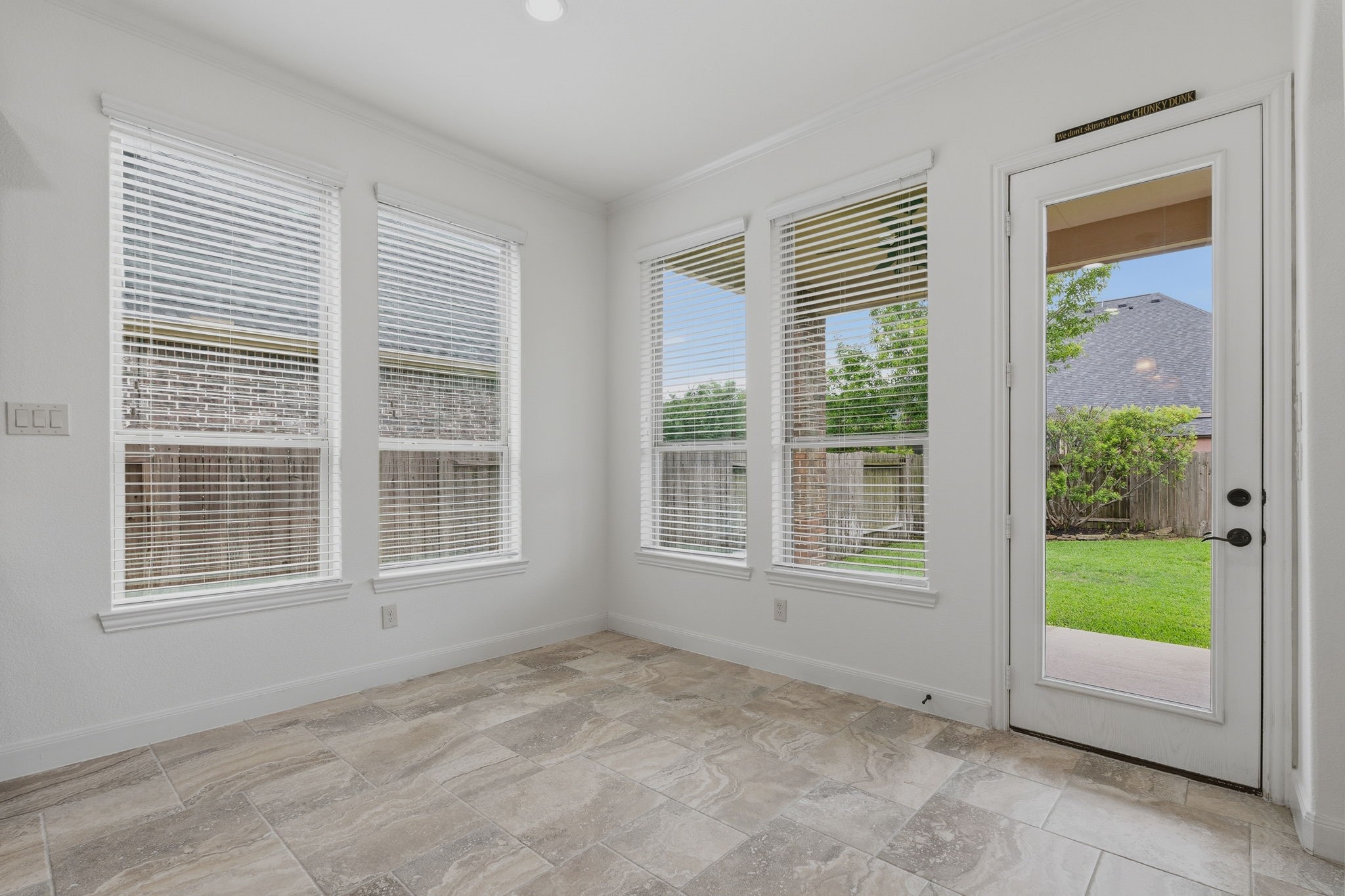 31407 Falling Cedar Court Spring, TX 77386 - Photo 11 of 47 Sipping on a cup of coffee planning your day or gathering for casual meals, this breakfast room is surrounded by windows!