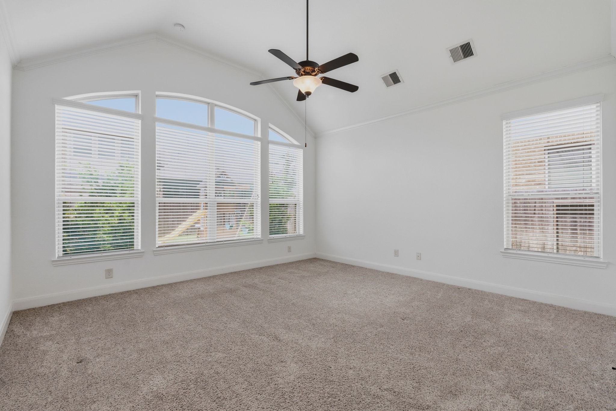 31407 Falling Cedar Court Spring, TX 77386 - Photo 12 of 47 The primary bedroom is full of natural light too! The windows are huge, and the room is 17 x 13!