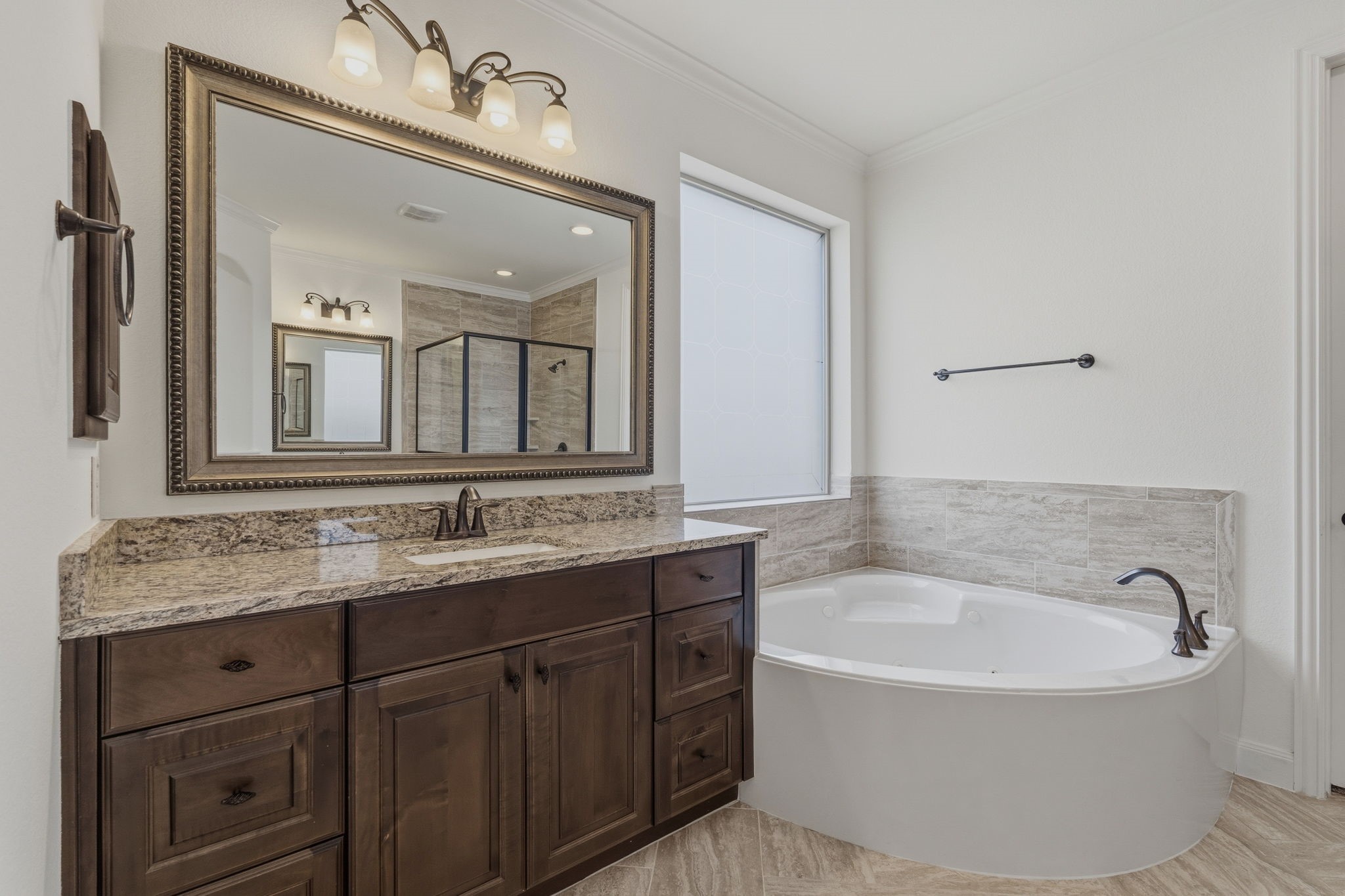 31407 Falling Cedar Court Spring, TX 77386 - Photo 15 of 47 Relax in the corner tub at the end of the day just allowing all your concerns just float away....