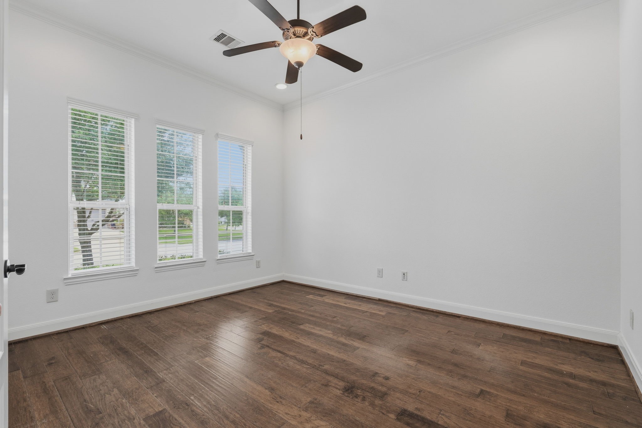 31407 Falling Cedar Court Spring, TX 77386 - Photo 20 of 47 Never miss who is coming or going in this study with the windows to the front of the home. Beautiful wood floors and 10 foot ceilings here too!