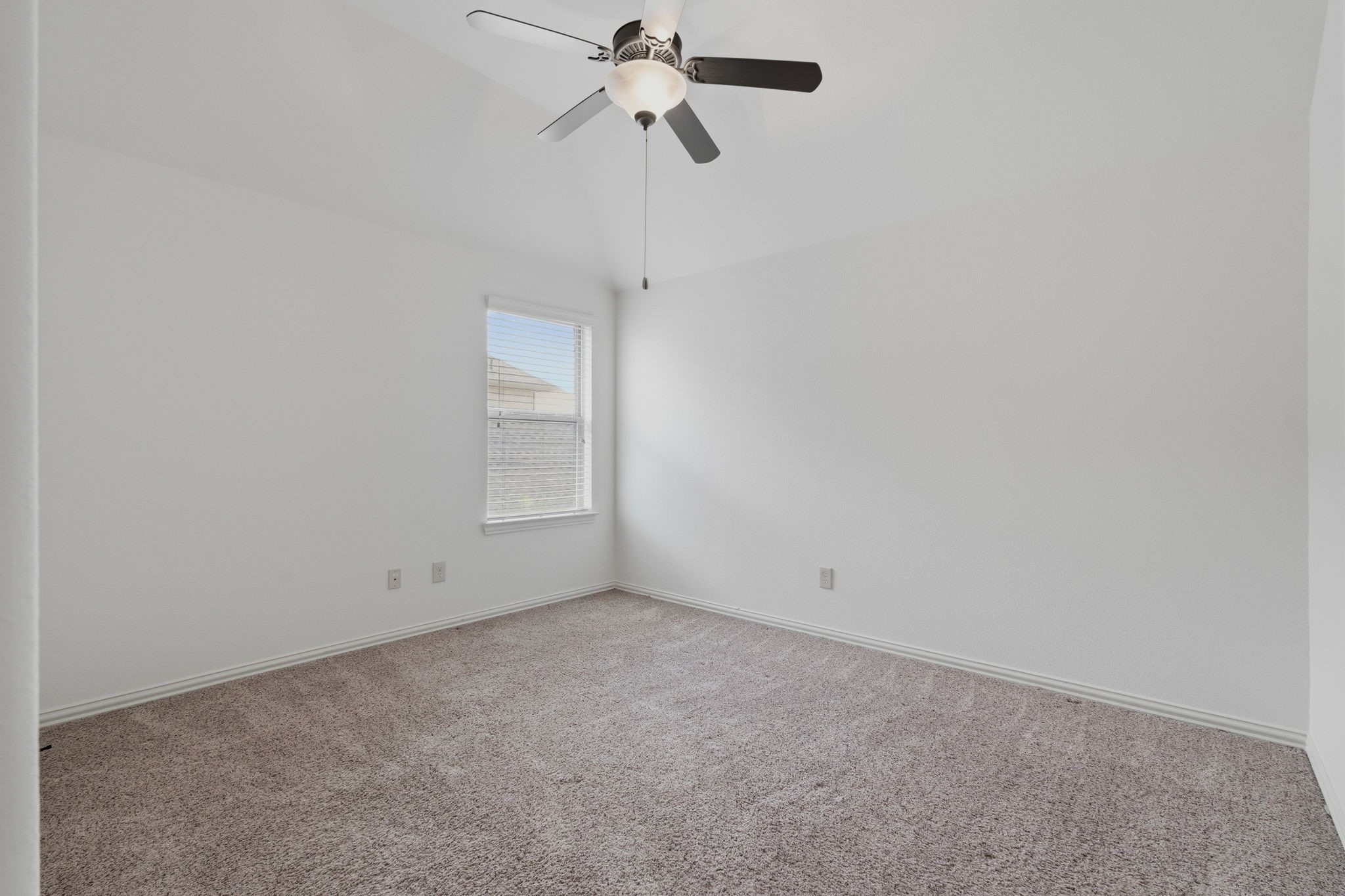 31407 Falling Cedar Court Spring, TX 77386 - Photo 23 of 47 One of the secondary bedrooms upstairs and it shares a bath with the next bedroom. 10 foot ceilings!