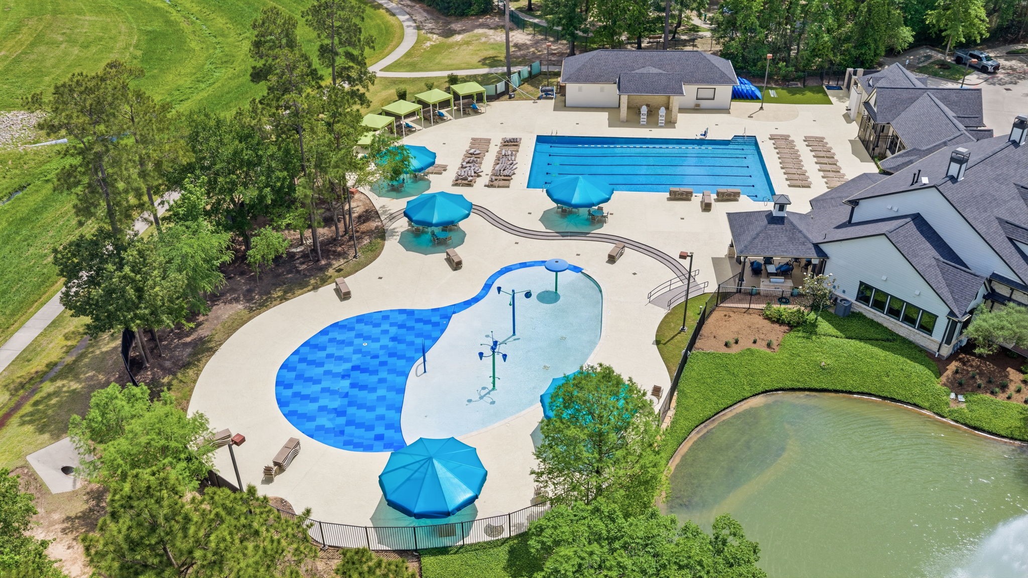 31407 Falling Cedar Court Spring, TX 77386 - Photo 39 of 47 This is the recreation center, just waiting for you to come and visit. It includes beach entry pool, splash pad, covered pavilions, firepit and grilling areas.