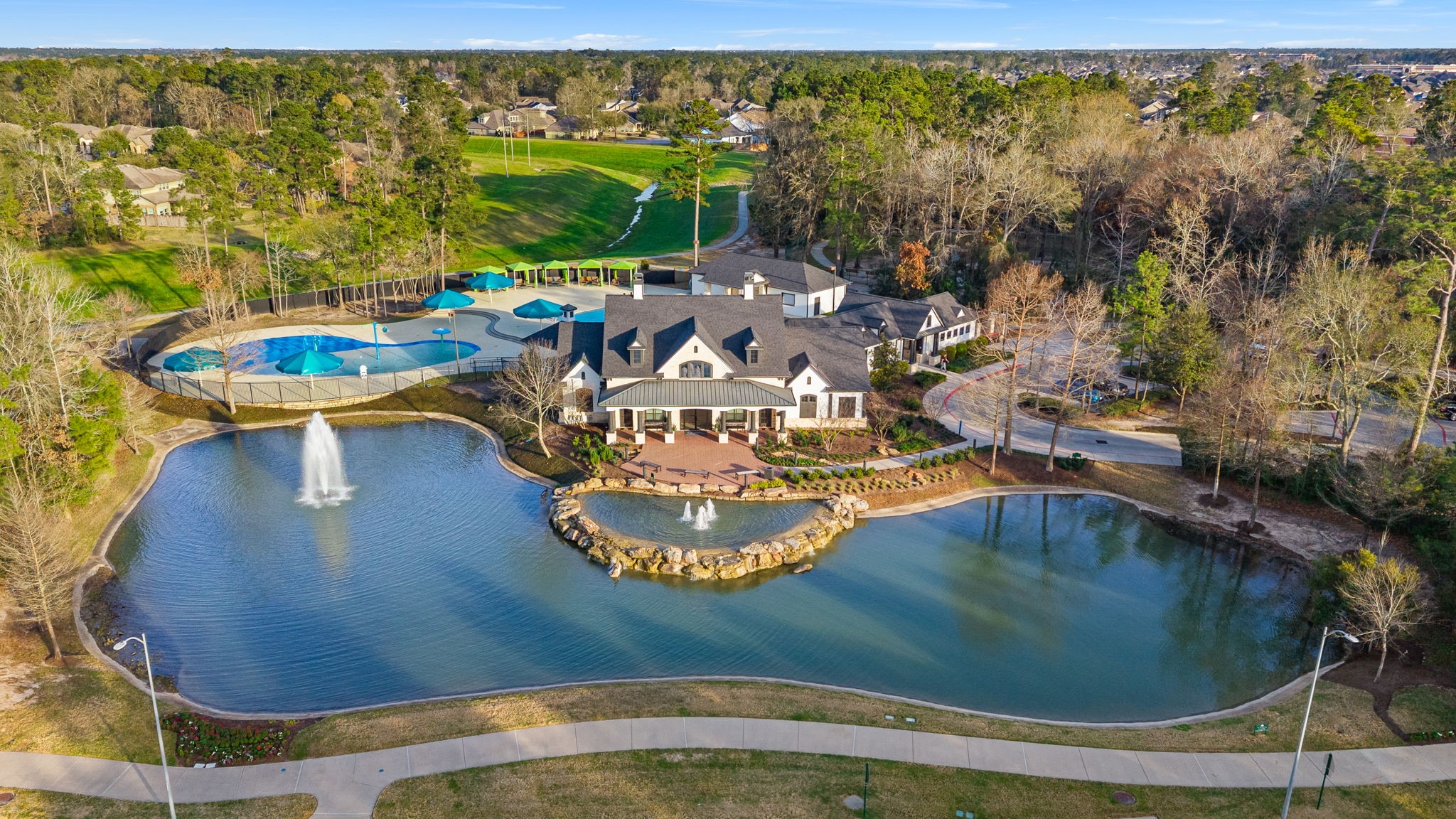 31407 Falling Cedar Court Spring, TX 77386 - Photo 40 of 47 Available is a full featured kitchen and grill, fitness center, tennis, pickleball and volleyball courts!