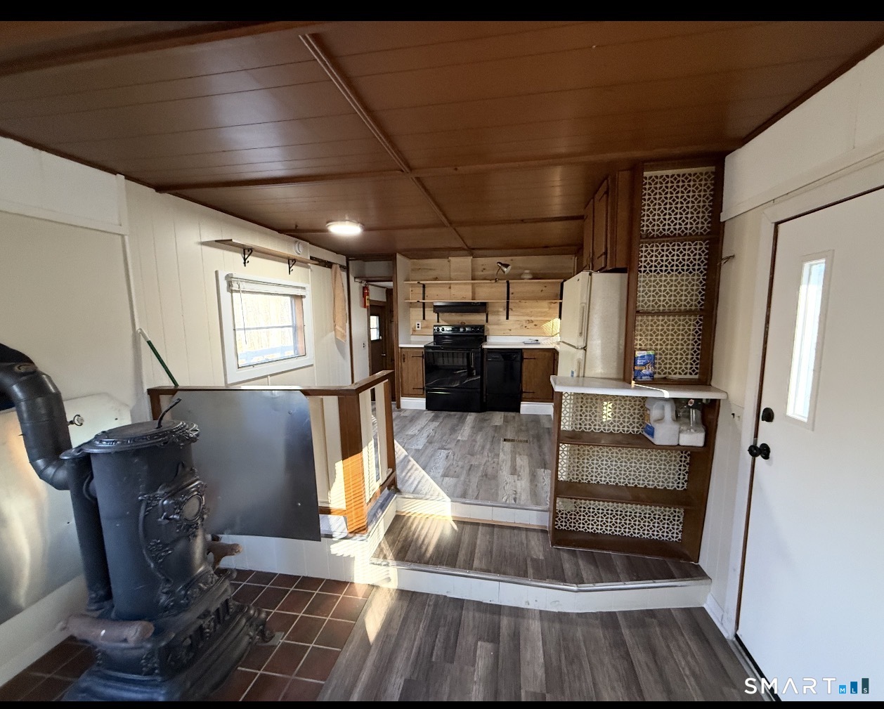 115 N Road Ashford, CT 06278 - Photo 5 of 19 a view of kitchen with furniture and refrigerator