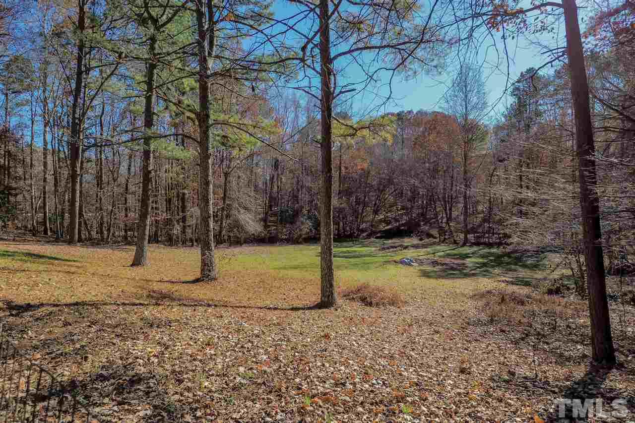 12345 Creedmoor Road Raleigh, NC 27613 - Photo 25 of 25 a view of a backyard of the house