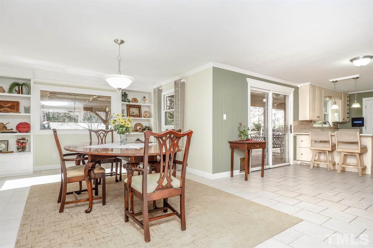 12345 Creedmoor Road Raleigh, NC 27613 - Photo 8 of 25 a view of a dining room with furniture