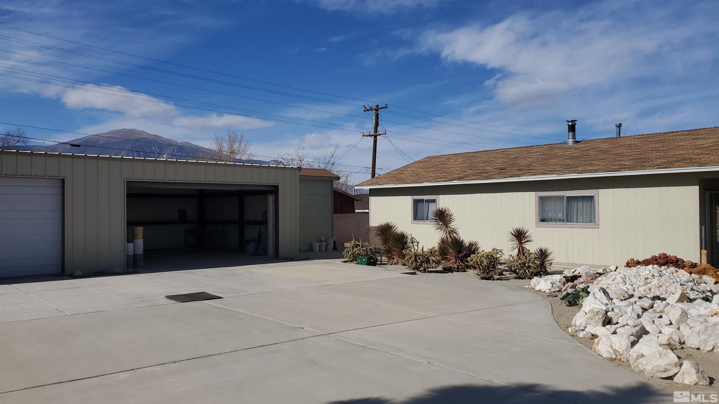 223 I Street Hawthorne, NV 89415 - Photo 1 of 13 a front view of a house