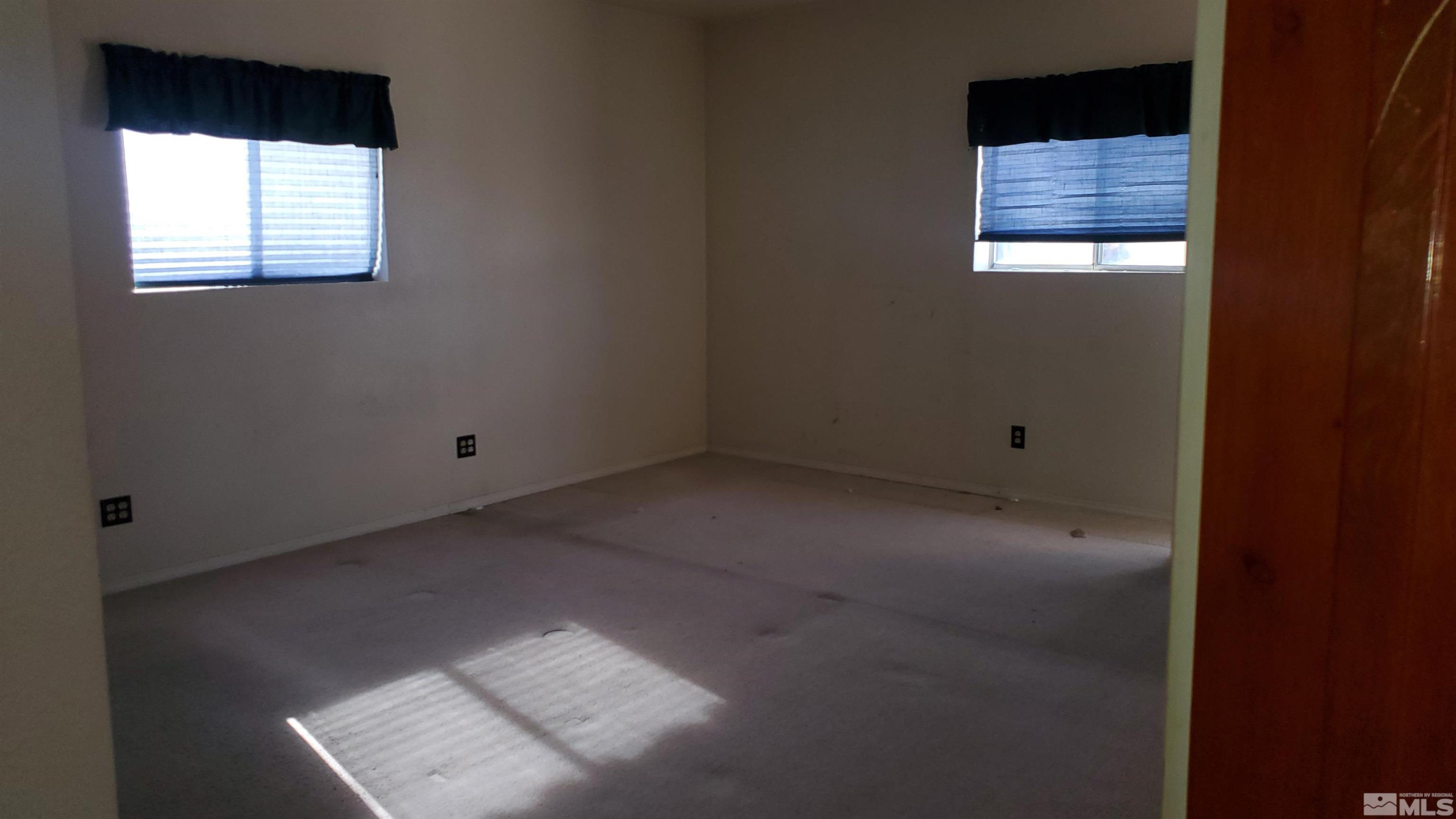 223 I Street Hawthorne, NV 89415 - Photo 13 of 13 an empty room with a window