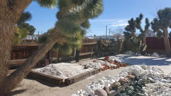 a view of a water fountain in front of house