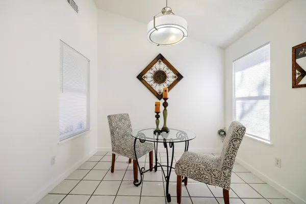 a view of a livingroom with furniture and window