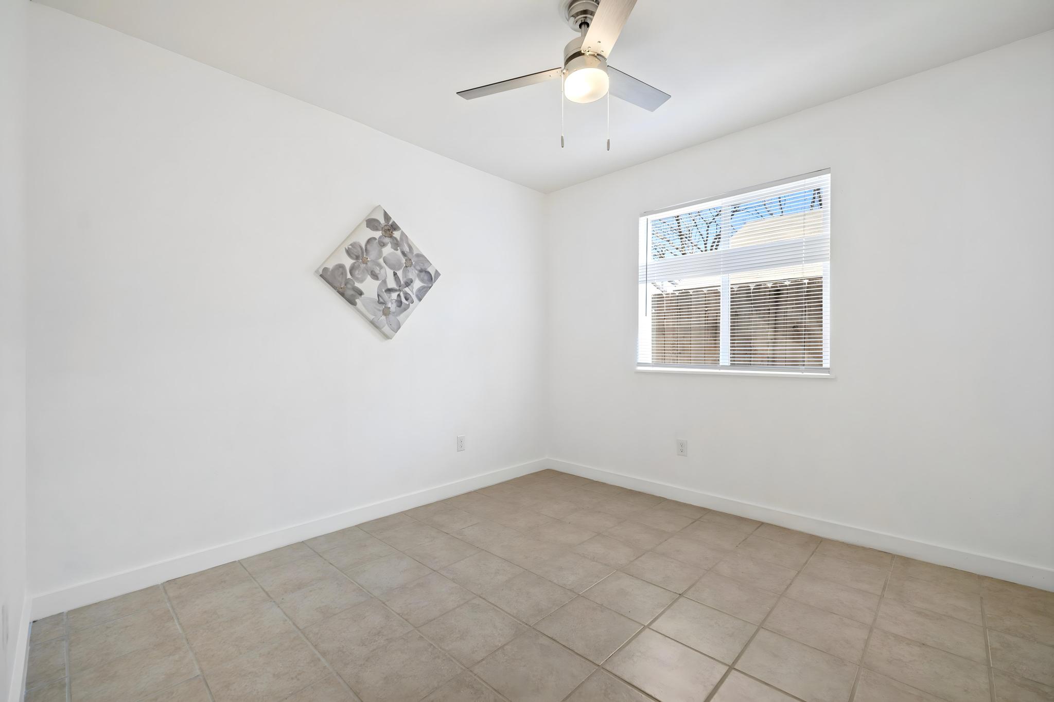 2614 Howellwood Way, Unit B Austin, TX 78748 - Photo 14 of 24 an empty room with a window