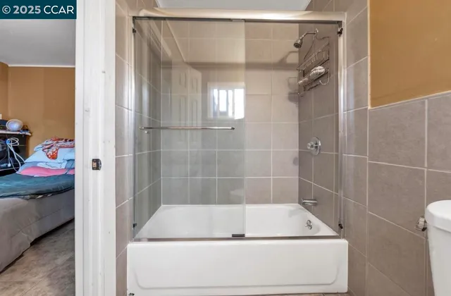 a bath tub sitting next to a bathroom