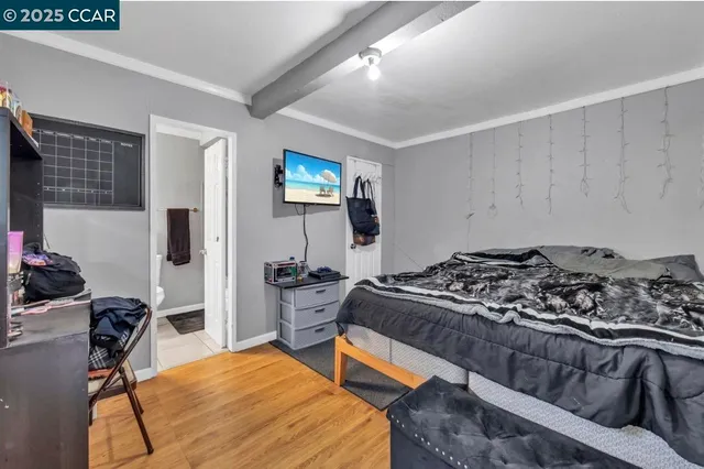 a bedroom with furniture and a bed