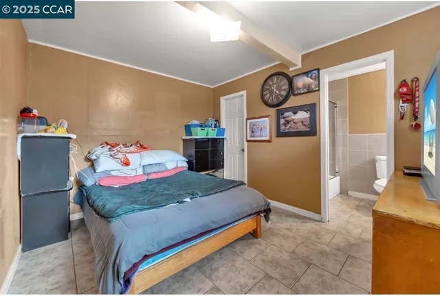 a bedroom with a bed and furniture