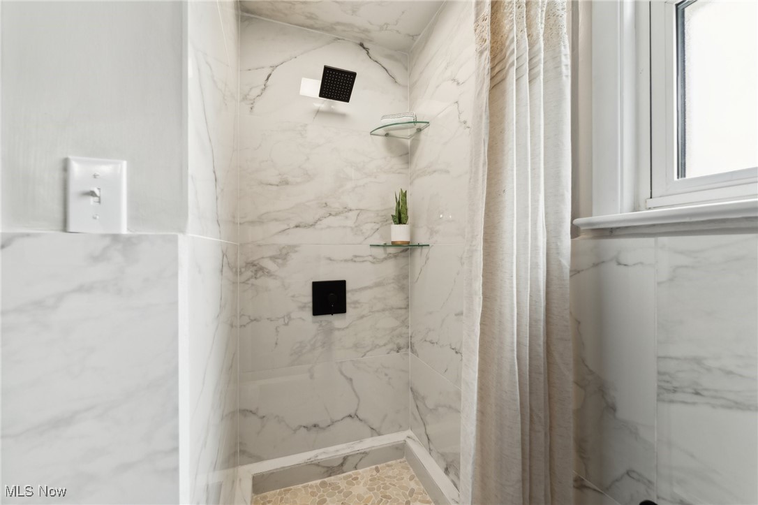 13225 Bagley Road Cleveland, OH 44130 - Photo 28 of 50 Bathroom with a marble finish shower