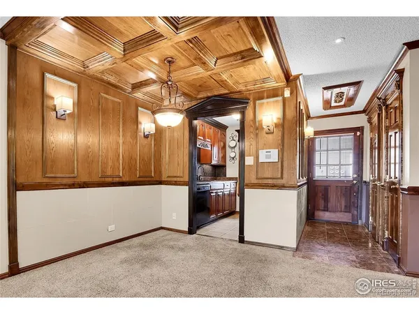 a living room with a bed and furniture