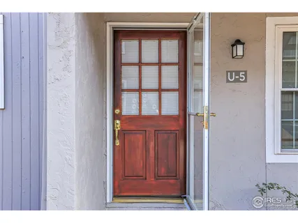 a view of entryway with front door