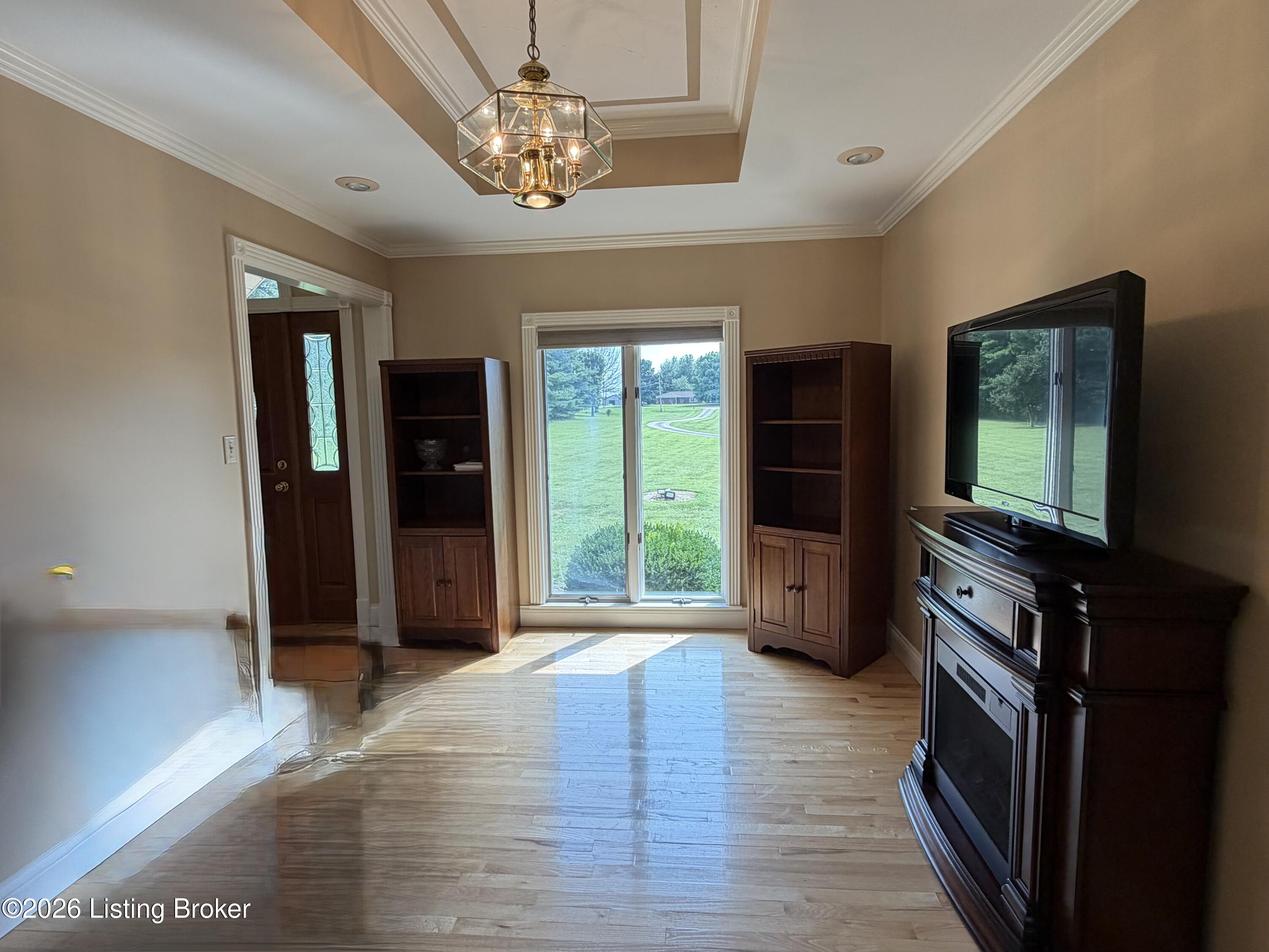 4898 Springfield Road Bardstown, KY 40004 - Photo 17 of 72 Family room with decorative ceiling & more lovely hardwood floors.