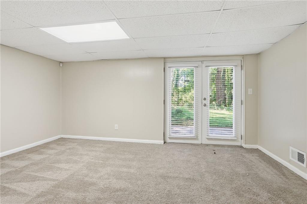 4505 Wonder Valley Trail Decatur, GA 30034 - Photo 19 of 34 a view of an empty room with a window