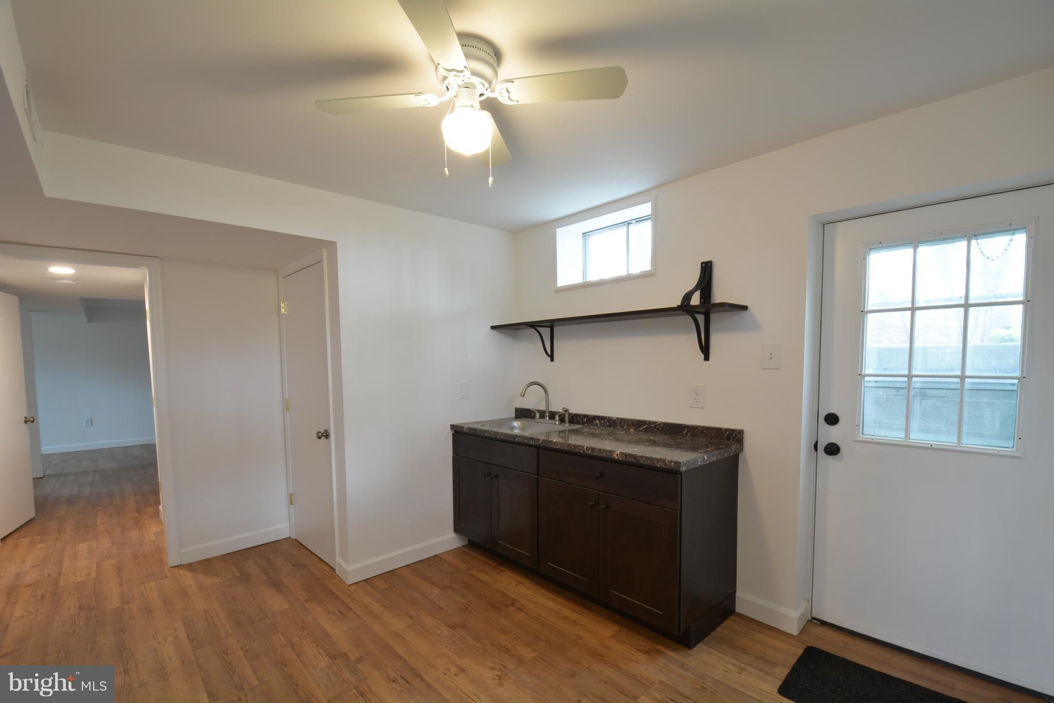 28409 Kemptown Road Damascus, MD 20872 - Photo 14 of 28 DEN/WET BAR