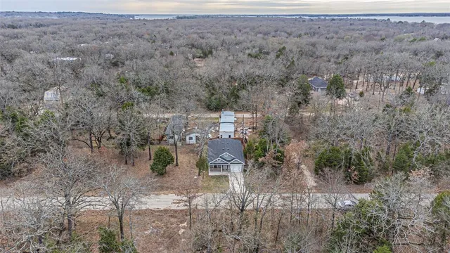 a view of a yard with an outdoor seating