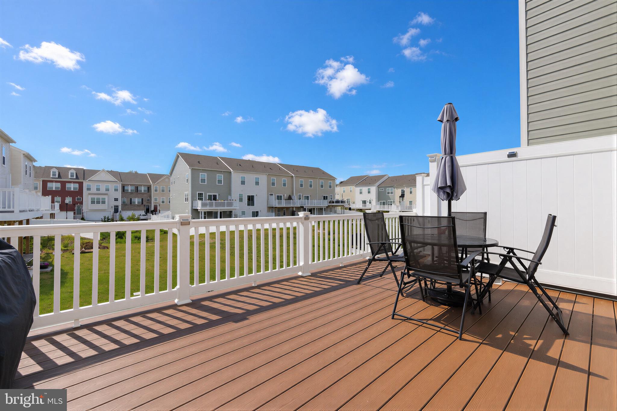 23658 Crosswinds Way California, MD 20619 - Photo 11 of 54 Enjoy meals on the maintenance free deck