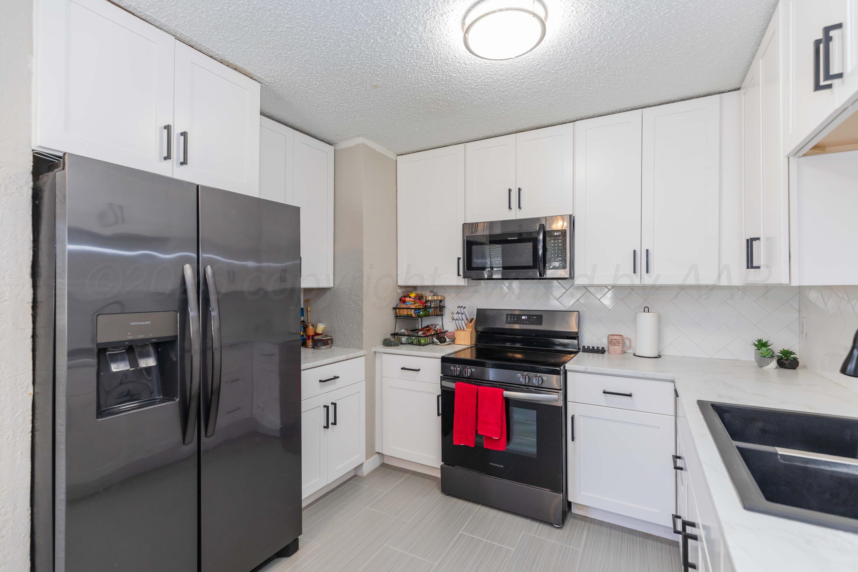 5120 Temple Drive Amarillo, TX 79110 - Photo 5 of 15 KITCHEN VIEW 2