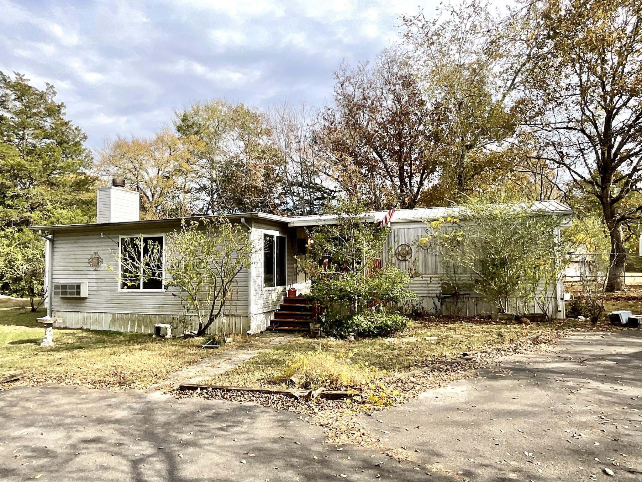 882 Cranor Road Murfreesboro, TN 37130 - Photo 5 of 8 a view of a house with a yard covered in snow