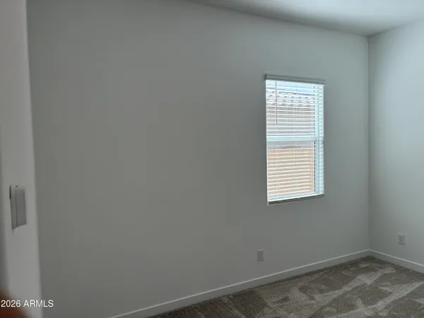 a view of a bathroom from a hallway