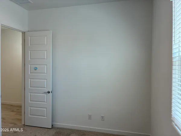 a bathroom with sink and mirror