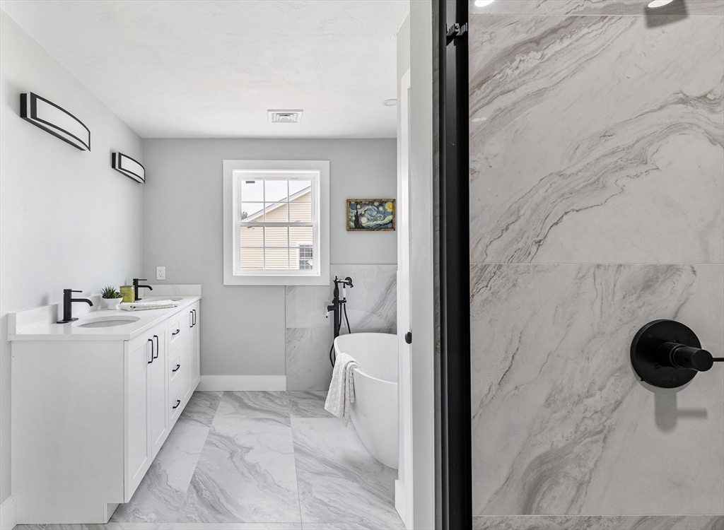 6 April Way Millis, MA 02054 - Photo 31 of 37 a bathroom with a sink and a toilet