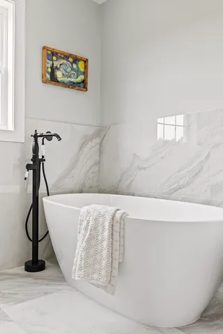 a living room with furniture and windows