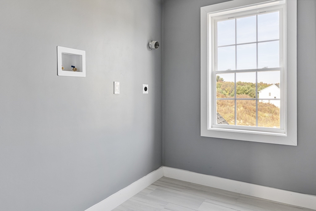 6 April Way Millis, MA 02054 - Photo 36 of 37 a view of an empty room with a window