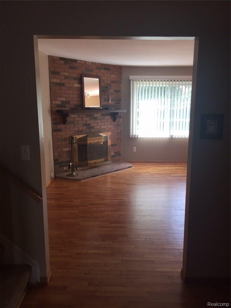 41717 Cherry Hill Road Novi, MI 48375 - Photo 6 of 41 Fireplace in living room.