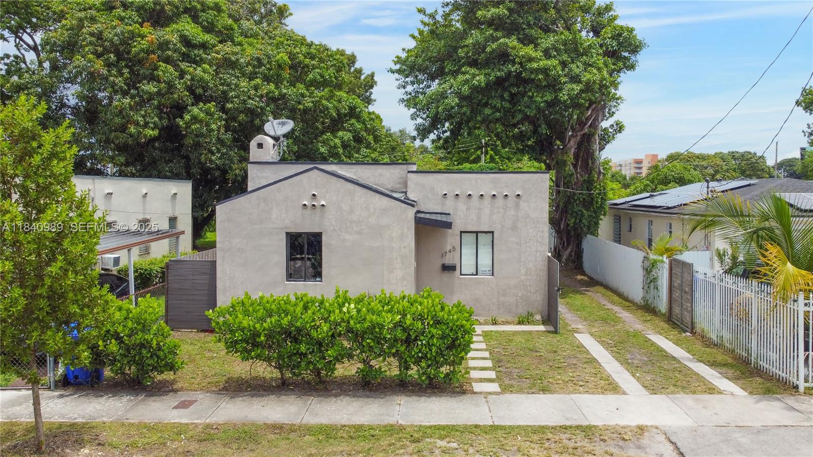 1745 Northwest 49th Street Miami, FL 33142 - Photo 25 of 30 an aerial view of a house