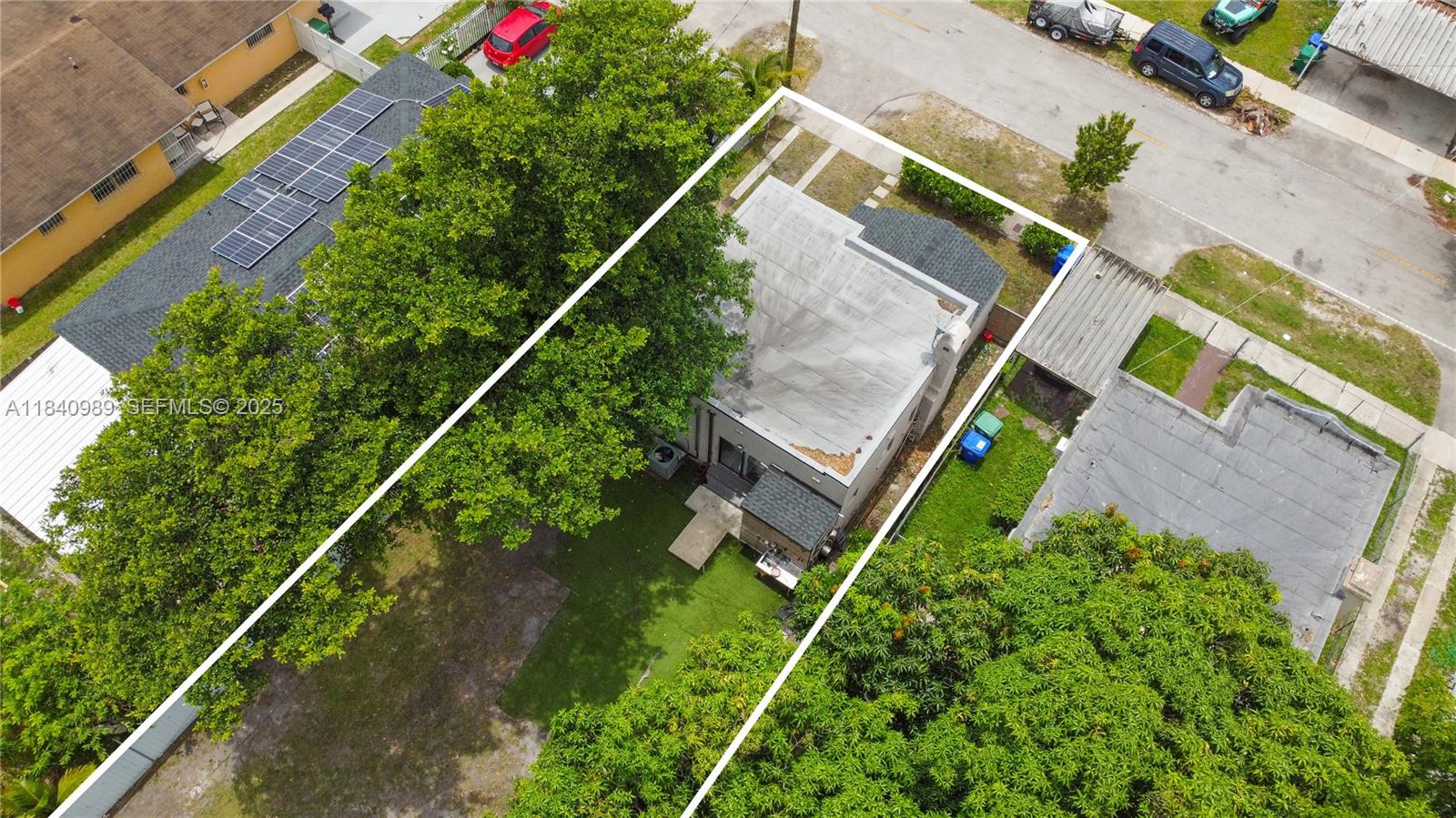 1745 Northwest 49th Street Miami, FL 33142 - Photo 30 of 30 an aerial view of house with swimming pool