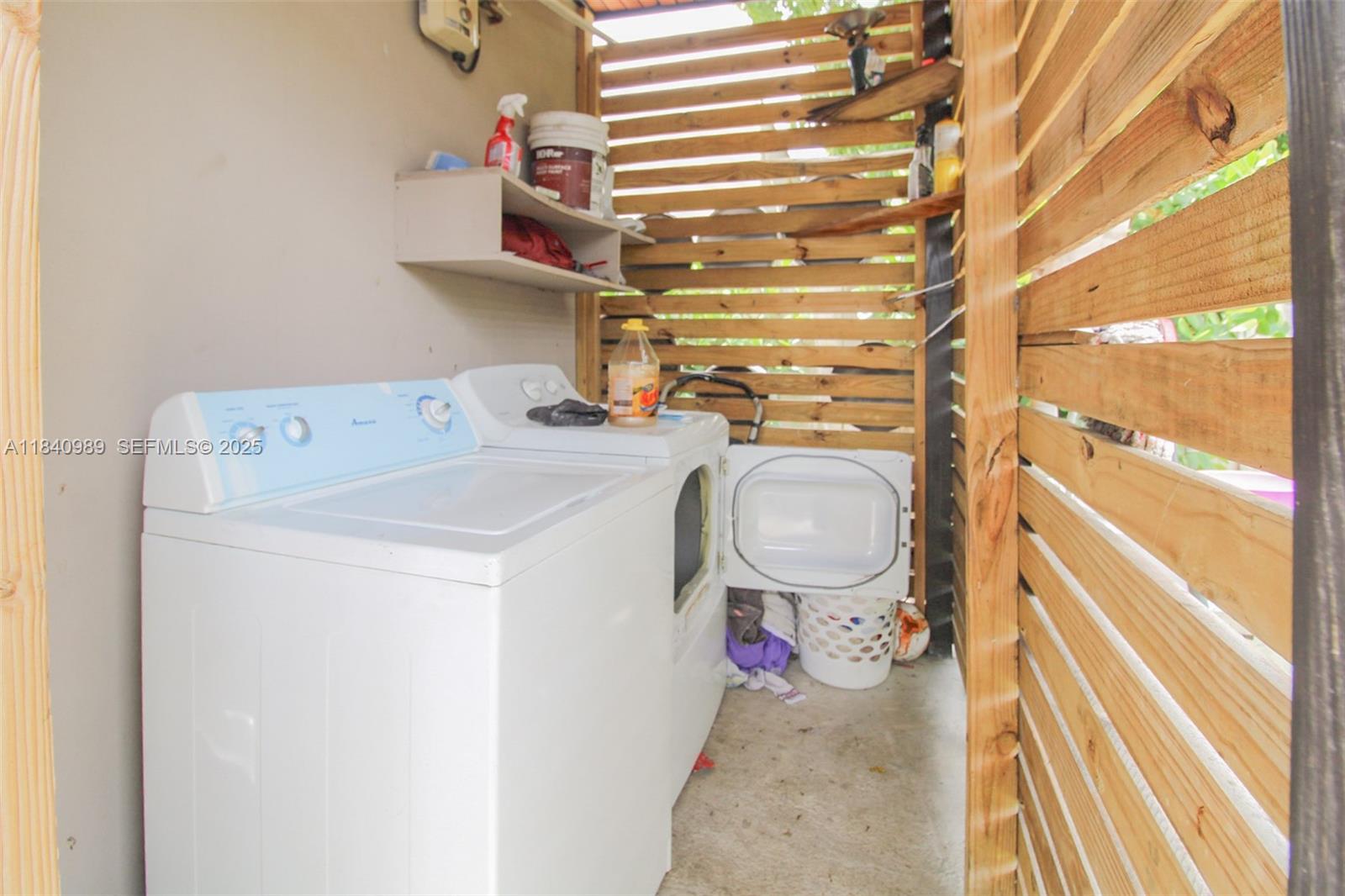 1745 Northwest 49th Street Miami, FL 33142 - Photo 10 of 30 a utility room with dryer and washer