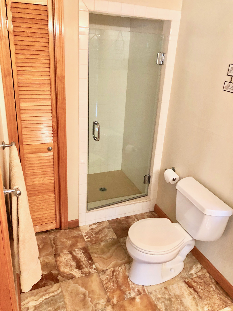 375 West Tisbury Road Edgartown, MA 02539 - Photo 20 of 32 a bathroom with a toilet and a shower