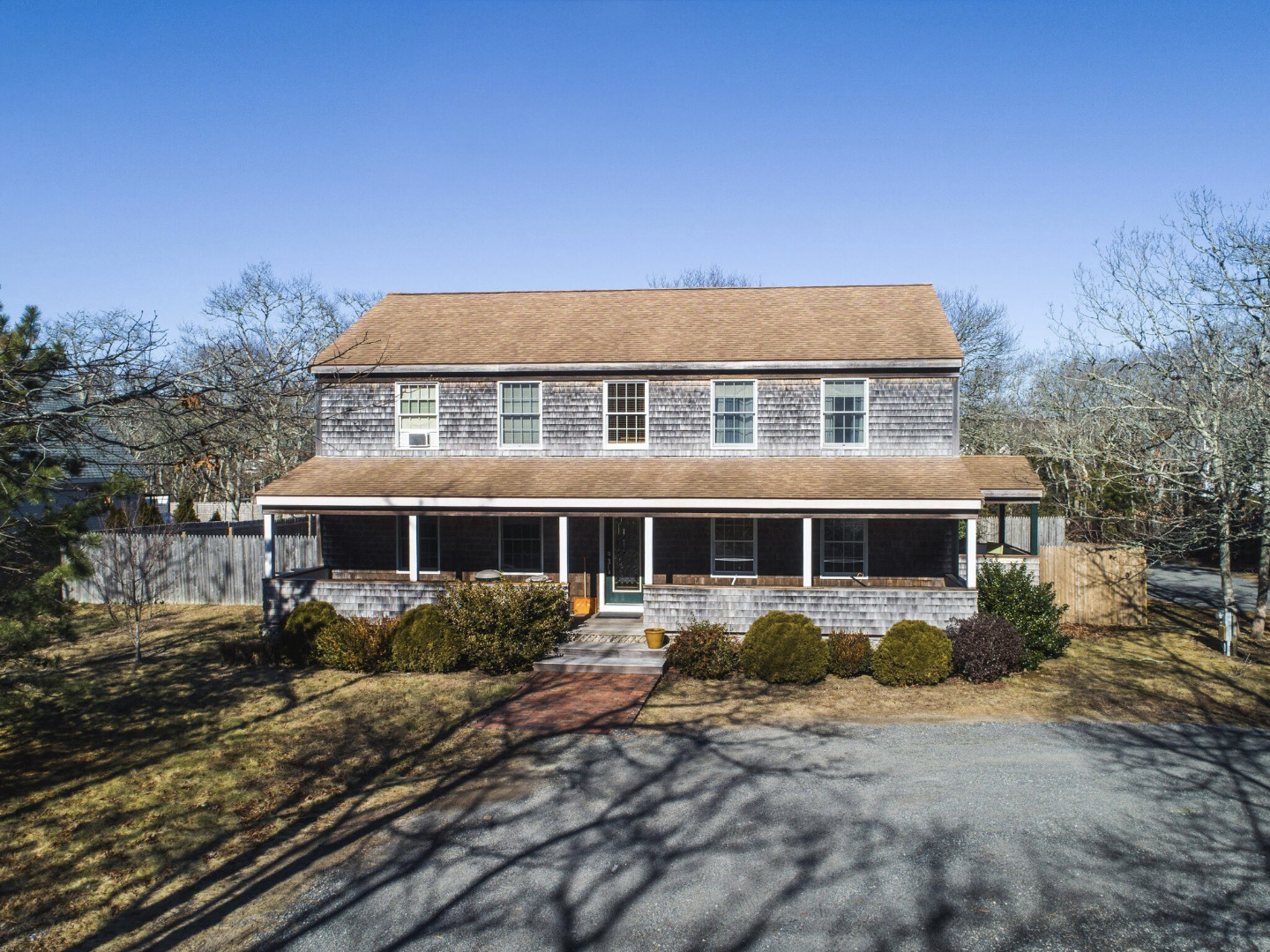 375 West Tisbury Road Edgartown, MA 02539 - Photo 3 of 32 a front view of a house with a yard