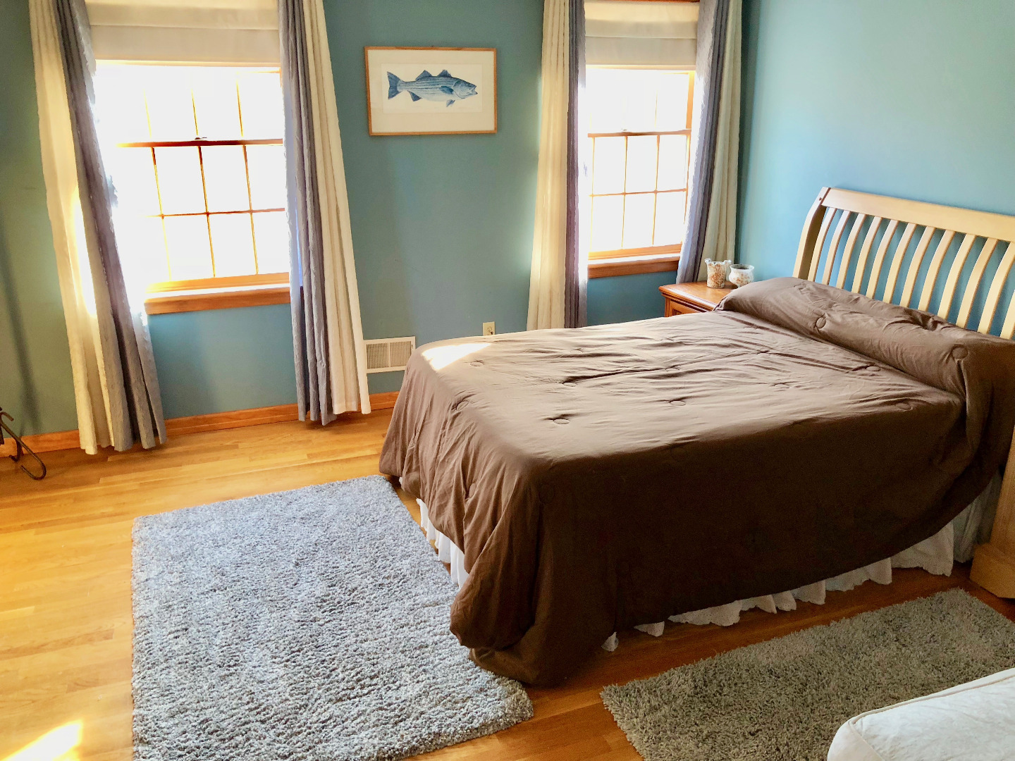 375 West Tisbury Road Edgartown, MA 02539 - Photo 27 of 32 a bedroom with a bed and a window