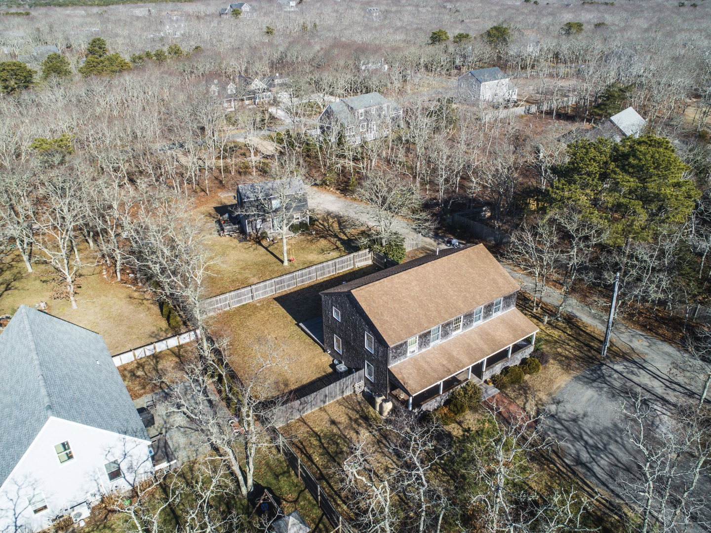 375 West Tisbury Road Edgartown, MA 02539 - Photo 5 of 32 an aerial view of a house with a yard and lake view