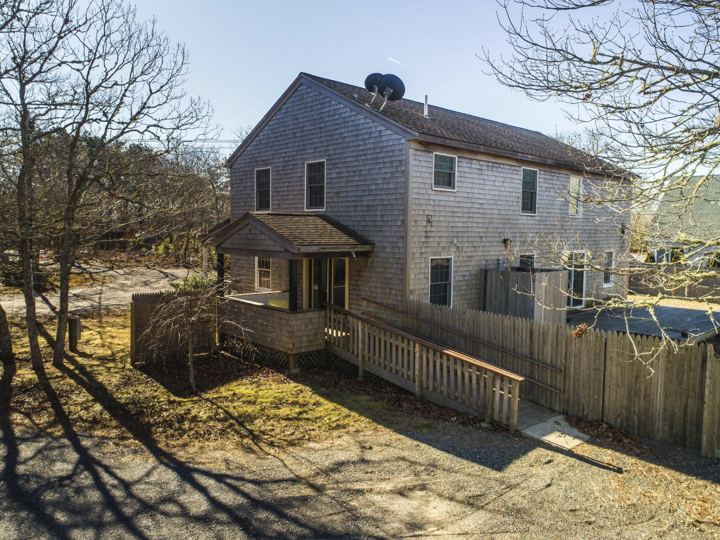375 West Tisbury Road Edgartown, MA 02539 - Photo 7 of 32 a front view of a house with a yard